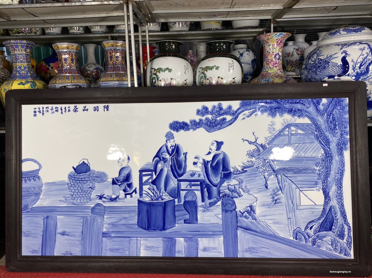 Tranh sứ vẽ lục vũ thẩm trà men lam